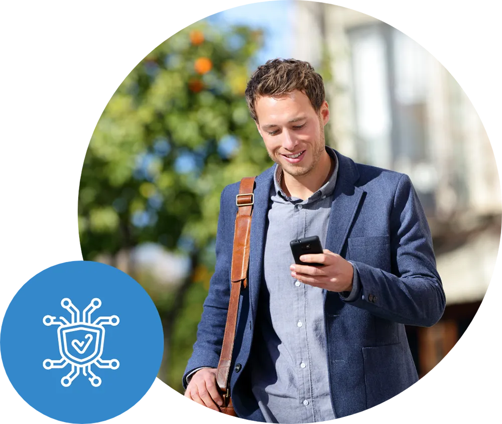 Businessman smiling and looking at phone
