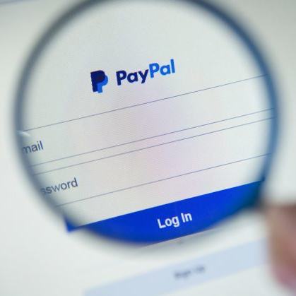 PayPal being looked at through a glass